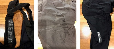 Cycling shorts laid out on a wooden surface.